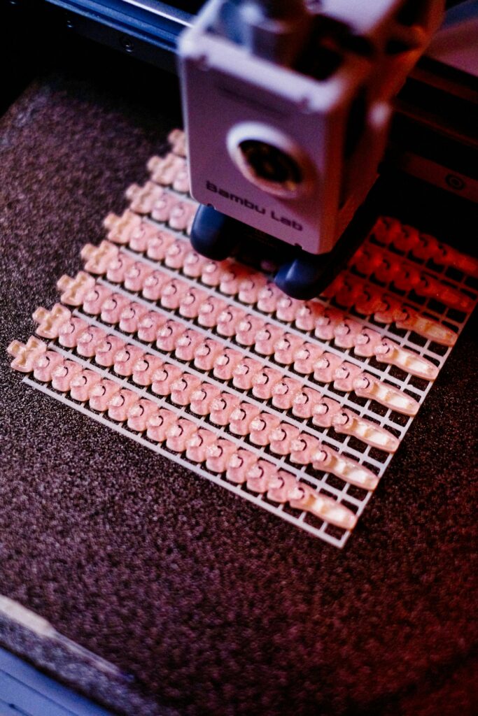 pexels-photo-32324486-32324486 Close-up of a 3D printer creating intricate patterns. Focus on precision and technology.